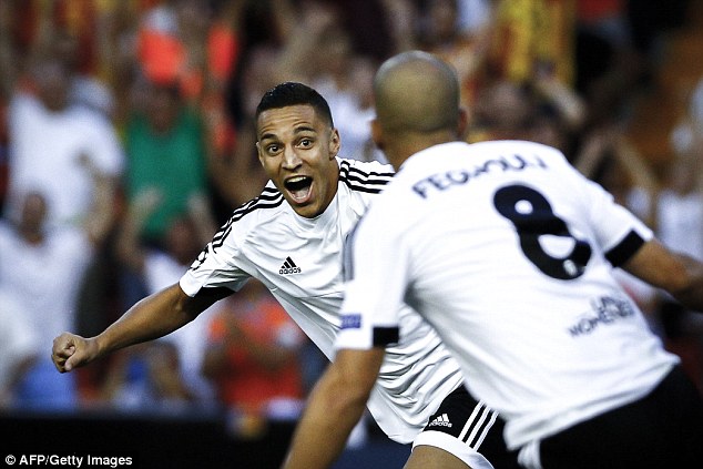 Rodrigo celebrating his goal with fellow goalscorer Sofiane Feghouli. (Daily Mail)