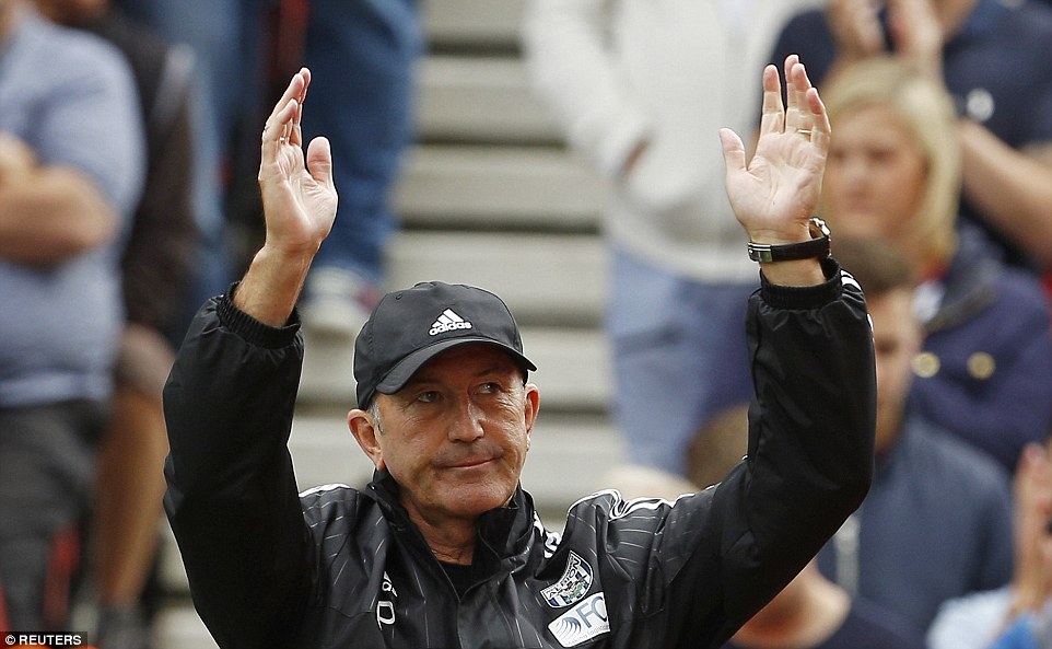 Pulis takes the applause of a fanbase he knows only too well (photo: reuters)