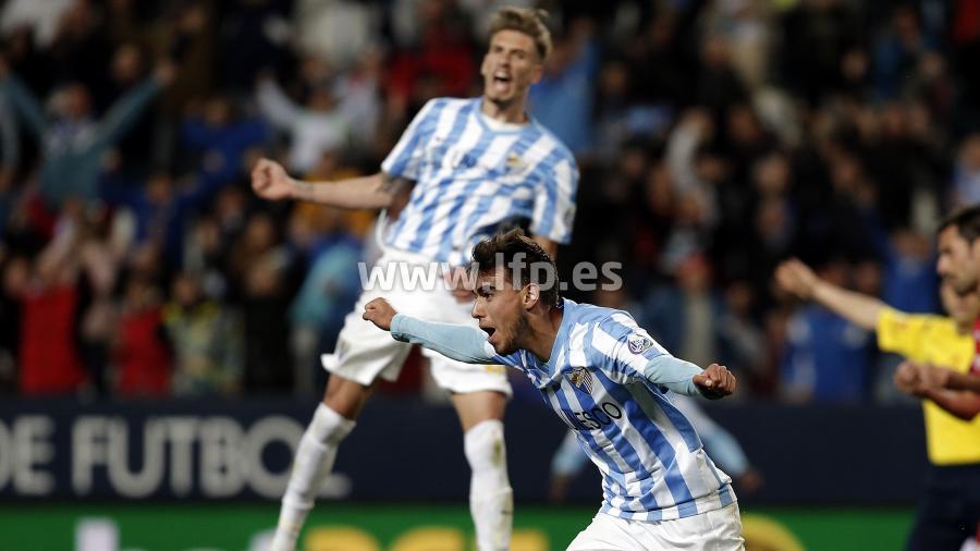 Los jugadores del Málaga CF celebran un gol ante el Getafe (Foto: LFP)