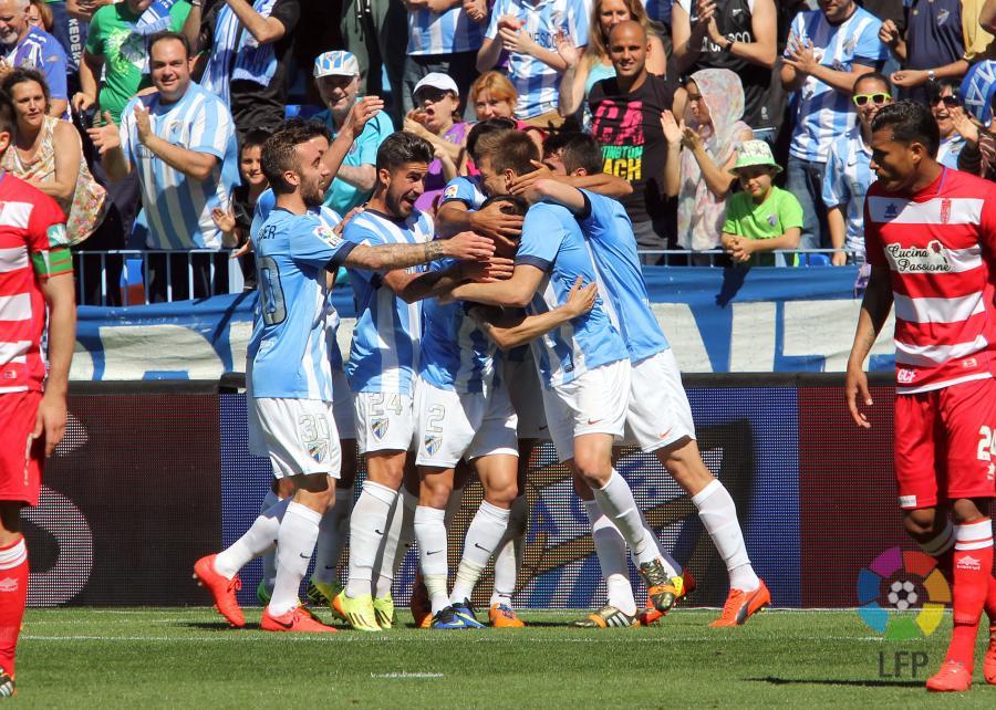 Los jugadores del Málaga CF celebran la victoria ante el Granada. Fotografía: LFP