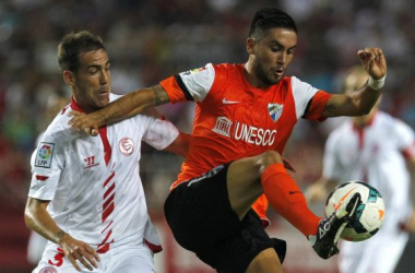 Gameiro salva un punto para el Sevilla ante un difícil Málaga