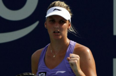 Kerber crashes out as Bouchard progresses