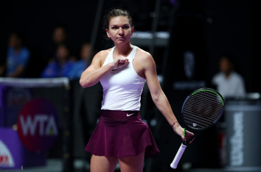 WTA Finals: Resilient Halep saves match point, beats Andreescu