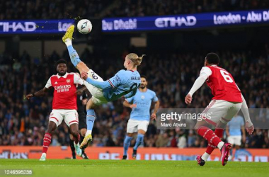 <h1 class="AssetCard-module__title___MNLOe"><br></h1><div class="AssetCard-module__caption___nD2x1">MANCHESTER, ENGLAND - JANUARY 27: Erling Haaland of Manchester City with an overhead kick shot during the Emirates FA Cup Fourth Round match between Manchester City and Arsenal at Etihad Stadium on January 27, 2023 in Manchester, England. (Photo by Marc Atkins/Getty Images)</div>