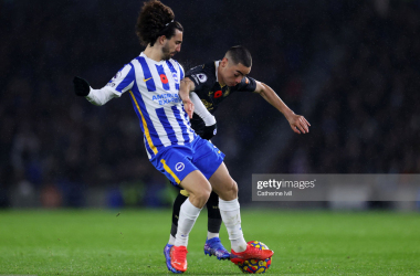 <p class="p1"><span class="s1">Miguel Almiron of Newcastle United is tackled by Marc Cucurella of Brighton &amp; Hove Albion during the Premier League match between Brighton &amp; Hove Albion and Newcastle United at American Express Community Stadium on November 06, 2021 in Brighton, England. (Photo by Catherine Ivill/Getty Images)</span></p>