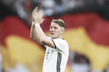 Germany captain Bastian Schweinsteiger announces international retirement