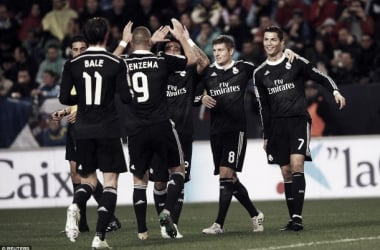 Malaga 1-2 Real Madrid: Benzema &amp; Bale keep Real top of the league