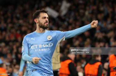 <div class="AssetCard-module__caption___nD2x1" data-testid="caption" style="box-sizing: inherit; padding-bottom: 14px;">MANCHESTER, ENGLAND - APRIL 26: Bernardo Silva of Manchester City celebrates after scoring a goal to make it 4-2 during the UEFA Champions League Semi Final Leg One match between Manchester City and Real Madrid at City of Manchester Stadium on April 26, 2022 in Manchester, United Kingdom. (Photo by James Williamson - AMA/Getty Images)</div>