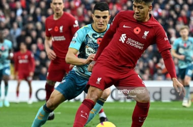 <span style="color: rgb(8, 8, 8); font-family: Lato, sans-serif; font-size: 14px; font-style: normal; text-align: start; background-color: rgb(255, 255, 255);">&nbsp;Roberto Firmino of Liverpool with Southampton's Mohamed Elyounoussi during the Premier League match between Liverpool FC and Southampton FC at Anfield on November 12, 2022 in Liverpool, England. (Photo by Andrew Powell/Liverpool FC via Getty Images)</span>