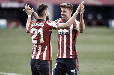 Carrasco y Llorente celebrando un gol | Foto: Atlético de Madrid
