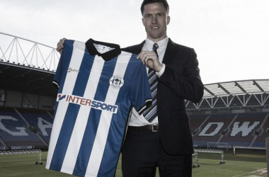 Gary Caldwell being presented as Wigan Athletic manager in April 2015 - source Mark Robinson, Daily Mail