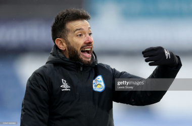 <div>Huddersfield Town v Reading - Sky Bet Championship</div><div>HUDDERSFIELD, ENGLAND - JANUARY 02: Carlos Corberan, Manager of Huddersfield Town reacts during the Sky Bet Championship match between Huddersfield Town and Reading at John Smith's Stadium on January 02, 2021 in Huddersfield, England. The match will be played without fans, behind closed doors as a Covid-19 precaution. (Photo by Lewis Storey/Getty Images)</div>