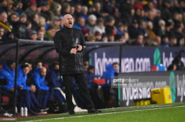 Sean Dyche barks orders to his players in the pouring rain at Turf Moor: Stu Forster/GettyImages