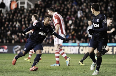 Stoke City v Manchester United: Hail stops play but United see it through