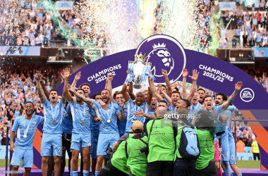 <div class="AssetCard-module__caption___nD2x1" data-testid="caption" style="box-sizing: inherit; padding-bottom: 14px;">MANCHESTER, ENGLAND - MAY 22: Fernandinho of Manchester City lifts the Premier League trophy after their side finished the season as Premier League champions during the Premier League match between Manchester City and Aston Villa at Etihad Stadium on May 22, 2022 in Manchester, England. (Photo by Stu Forster/Getty Images)</div>