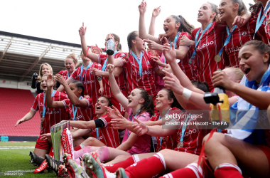 Bristol City celebrates with the Women's Championship Trophy after securing promotion to the Women's Super League.&nbsp;(Photo by Ryan Hiscott - The FA/The FA via Getty Images)