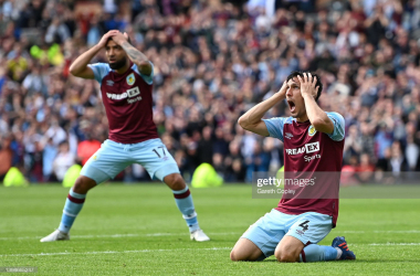 Jack Cork and Aaron Lennon react to a missed opportunity as Burnley falter to Newcastle: Gareth Copley/GettyImages