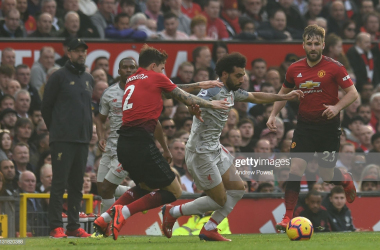 Manchester United 0-0 Liverpool: Injury-hit hosts hold firm to deny title challenging visitors key win