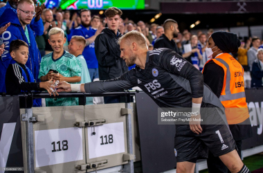LONDON, ENGLAND - AUGUST 23: Kasper Schmeichel of Leicester City gives away his captain armband to young fan during the Premier League match between West Ham United and Leicester City at The London Stadium on August 23, 2021 in London, England. (Photo by Sebastian Frej/MB Media/Getty Images)