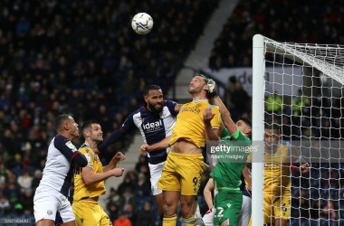 Andy Carroll challenges during the clash between Reading and Albion earlier this season -&nbsp;Photo by Adam Fradgley/West Bromwich Albion FC via Getty Images