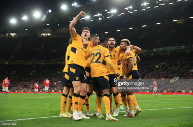 MANCHESTER, ENGLAND - JANUARY 03: Max Kilman of Wolverhampton Wanderers (L) celebrates with teammates after their late winner during the Premier League match between Manchester United and Wolverhampton Wanderers at Old Trafford on January 3, 2022 in Manchester, England. (Photo by Simon Stacpoole/Offside/Offside via Getty Images)