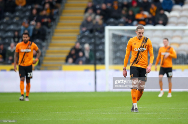 <div>HULL, ENGLAND - JANUARY 16: A dejected Tom Eaves of Hull City after conceding the opening goal during the Sky Bet Championship match between Hull City and Stoke City at MKM Stadium on January 16, 2022 in Hull, England. (Photo by Robbie Jay Barratt - AMA/Getty Images)</div>