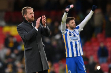 Graham Pottet applauds Brighton fans at full-time