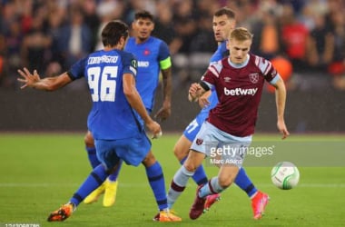 Flynn Downes takes on two players during West Ham's first leg against FCSB. Marc Atkins/Getty Images.