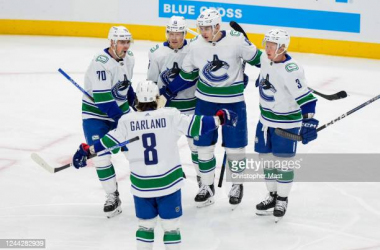 Canucks hang on against Kraken for first win of the season