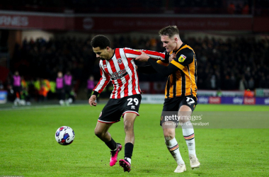 Illiman Ndiaye, of Sheffield United, battles for possession with Sean McLoughlin. (Photo by Alex Dodd- CameraSport via Getty Images)