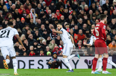 Karim Benzema celebrates scoring against Liverpool in the Champions League round of 16 first-leg (Photo: Richard Callis/Eurasia Sport Images via GETTY Images)