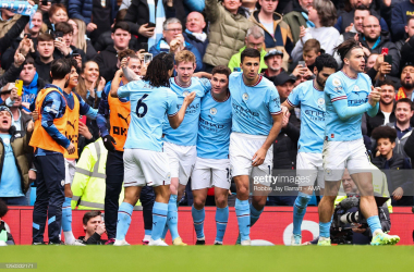 Manchester City celebrate their second goal against Liverpool (Photo by Robbie Jay Barratt - AMA/Getty Images)