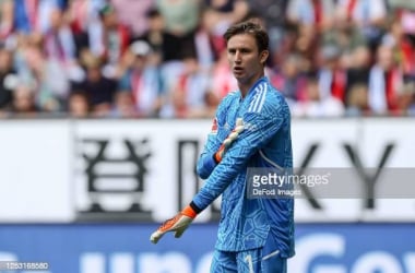 <div>AUGSBURG, GERMANY - MAY 06: goalkeeper Frederik Roennow of 1.FC Union Berlin looks on during the Bundesliga match between FC Augsburg and 1. FC Union Berlin at WWK-Arena on May 6, 2023 in Augsburg, Germany. (Photo by Roland Krivec/DeFodi Images via Getty Images)</div>
