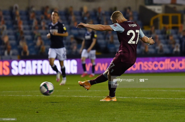 Millwall 0-2 Burnley: Clarets show Premier League class to book
place in Last-16