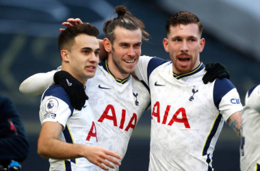 <div>LONDON, ENGLAND - FEBRUARY 28: Gareth Bale (C) of Tottenham Hotspur celebrates with team mates (L - R) Sergio Reguilon and Pierre-Emile Hojbjerg after scoring their side's fourth goal during the Premier League match between Tottenham Hotspur and Burnley at Tottenham Hotspur Stadium on February 28, 2021 in London, England. Sporting stadiums around the UK remain under strict restrictions due to the Coronavirus Pandemic as Government social distancing laws prohibit fans inside venues resulting in games being played behind closed doors. (Photo by Matthew Childs - Pool/Getty Images)</div><div><br></div>