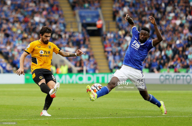 LEICESTER, ENGLAND - AUGUST 14: Ruben Neves of Wolverhampton Wanderers has his shot blocked by Wilfred Ndidi of Leicester City during the Premier League match between Leicester City and Wolverhampton Wanderers at The King Power Stadium on August 14, 2021 in Leicester, England. (Photo by Jack Thomas - WWFC/Wolves via Getty Images)