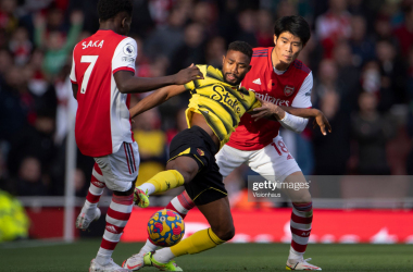 Emmanuel Dennis battles with Bukayo Saka and Takehiro Tomiyasu in the last encounter between these two. Arsenal beat Watford 1-0. Getty Images / Visionhaus