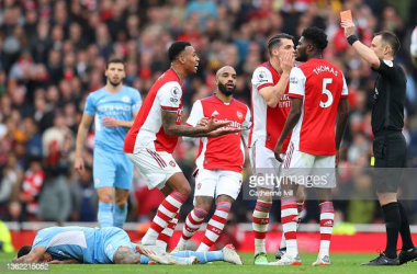 Gabriel Magalhaes of Arsenal is shown a second yellow card leading to a red card by Referee, Stuart Attwell for a foul on Gabriel Jesus of Manchester City during the Premier League match between Arsenal and Manchester City at Emirates Stadium on January 01, 2022 in London, England. (Photo by Catherine Ivill/Getty Images)