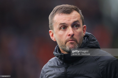 <div>HUDDERSFIELD, ENGLAND - MAY 16: Nathan Jones, manager of Luton Town, looks on during the Sky Bet Championship Play-Off Semi Final 2nd Leg match between Huddersfield Town and Luton Town at John Smith's Stadium on May 16, 2022 in Huddersfield, England. (Photo by James Gill - Danehouse/Getty Images)</div>