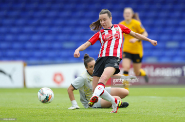 <div>STOCKPORT, ENGLAND - MAY 21: Sophie Pharoah of Southampton scores their team's first goal during The FA Women's National League Play-off Final between Southampton and Wolverhampton Wanderers at Edgeley Park on May 21, 2022 in Stockport, England. (Photo by Cameron Smith/Getty Images)</div>