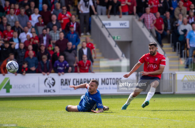 YORK, ENGLAND - MAY 21: Maz Kouhyar of York City scores his teams second goal with team mates during the National League North Play Off Final match between York City and Boston United at LNER Community Stadium on May 21, 2022 in York, England. (Photo by Emma Simpson/Getty Images)