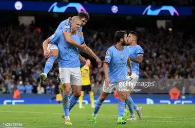 Manchester City celebrate Erling Haaland's late winner. (Photo by Michael Regan/Getty Images).
