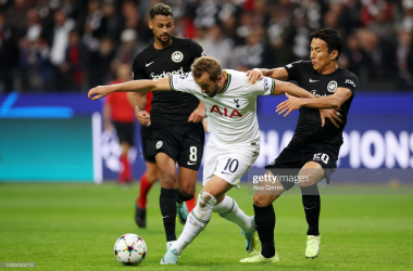 Harry Kane battles for the ball against Makoto Hasebe (Photo by Alex Grimm/Getty Images)