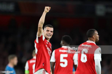 Granit Xhaka celebrates scoring the goal that guarantees Arsenal an Europa League knockout spot. Catherine Ivill/Getty Images.