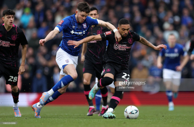 <div>IPSWICH, ENGLAND - JANUARY 28: George Hirst of Ipswich holds back Vitinho Da Silva of Burnley during the Emirates FA Cup Fourth Round match between Ipswich Town and Burnley at Portman Road on January 28, 2023 in Ipswich, England. (Photo by Julian Finney/Getty Images)</div>