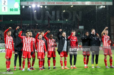Union Berlin players salute their fans after their DFB Pokal win over Wolfsburg