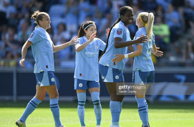 <span style="caret-color: rgb(0, 0, 0); color: rgb(0, 0, 0); font-family: -webkit-standard; font-size: medium; font-style: normal; text-align: start;">Khadija Shaw of Manchester City celebrates with teammate Chloe Kelly after scoring the team's first goal during the FA Women's Super League match between Manchester City and Everton FC at The Academy Stadium on May 27, 2023 in Manchester, England. (Photo by Gareth Copley/Getty Images)</span>