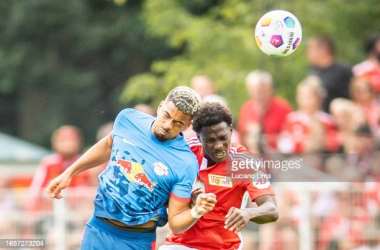 BERLIN, GERMANY - SEPTEMBER 03: Benjamin Henrichs of RB Leipzig wins a header against David Datro Fofana of 1. FC Union Berlin during the Bundesliga match between 1. FC Union Berlin and RB Leipzig at An der Alten Foersterei on September 03, 2023 in Berlin, Germany. (Photo by Luciano Lima/Getty Images)