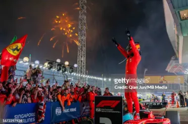 <div class="getty embed image"><div>Carlos Sainz celebrates after winning the Singapore Grand Prix - (Photo by Qian Jun/MB Media/Getty Images)<br></div><div></div></div>
