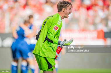 BERLIN, GERMANY - SEPTEMBER 23: Frederik Roennow of 1. FC Union Berlin complains with teammates during the Bundesliga match between 1. FC Union Berlin and TSG Hoffenheim at An der Alten Foersterei on September 23, 2023 in Berlin, Germany. (Photo by Luciano Lima/Getty Images)